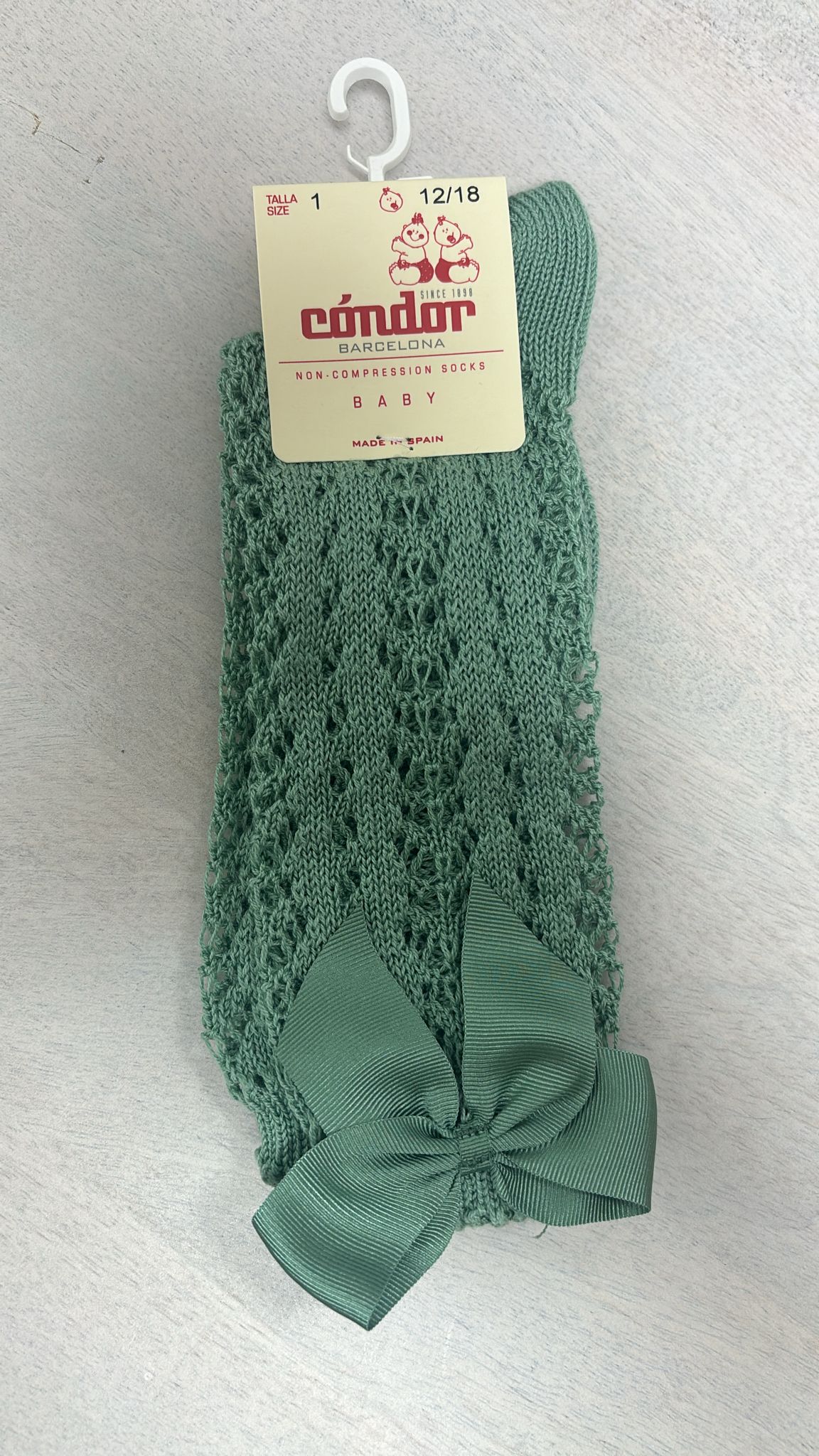Calcetines altos perlé calados con lazo grogrén M.2519/704 JADE CONDOR 1 original F1310448 5159 4756 9B07 A8D6EB5E3E8A