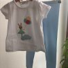 CONJUNTO 2 PIEZAS NIÑA M. CONEJO CELESTE TRAPITOS 8 Conjunto niña celeste de camiseta de manga corta con bordado delantero y leggins largos