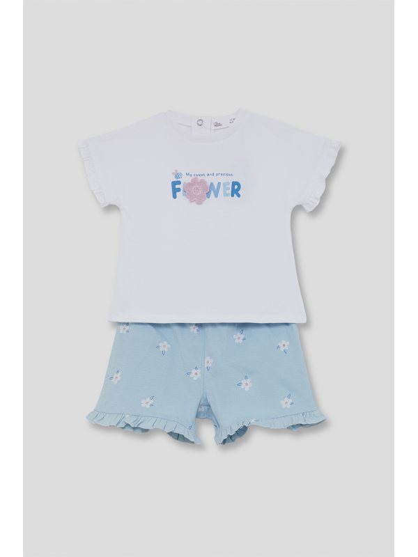 Conjunto bebé niña M. 263026 CELESTE STREET MONKEY 1 Conjunto celeste bebé niña con camiseta blanca de volantes y pantalón corto celeste de flores