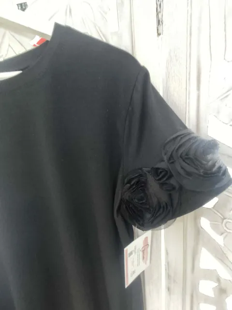 CAMISETA NEGRA CON ESTAMPADO FLORES M.MR/NF 2 2 32