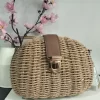 BOLSO CONFECCIONADO EN TEJIDO DE RAFIA TRENZADO EN TONO CAMEL M.RAF-CM