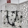 BOLSO DE PLAYA BEIGE CON ESTAMPADO DE ESTRELLAS NEGRAS M.NG-101
