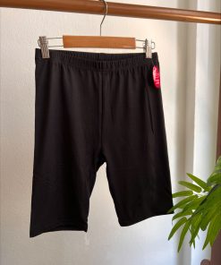 Leggins cortos ciclistas negros de tejido antilejía, elásticos y con cintura cómoda, en cuatro rangos de talla