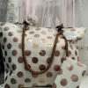 BOLSO DE PLAYA BEIGE CON ESTAMPADO DE LUNARES EN TONO ORO ROSADO M.ES-315