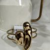 BRAZALETE DORADO CON DETALLE DE PIEDRAS M.BRA-PI