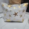 BOLSO DE PLAYA ESTAMPADO ESTRELLAS MARINAS DORADAS M.ESTRE-MAR