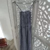Mono vichy azul marino y blanco con tirantes finos, bolsillos y pernera ancha y recta