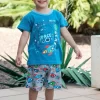 PIJAMA INFANTIL NIÑO M. KN-112 COHETES KINANIT 10 Pijama infantil de niño con camiseta azul y pantalón corto estampado de cohetes