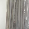 PANTALÓN BOMBACHO ESTAMPADO RAYAS VERTICALES MARRÓN CHOCOLATE M.PE-MC2 7 Pantalón bombacho marrón chocolate con rayas verticales en beige, gris y azul claro, talla única