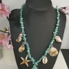 COLLAR CON PIEDRAS TURQUESAS Y CARACOLA VERDE MAR M.CO-CVM 6 Collar de caracola verde mar con cuentas turquesa y colgantes marinos