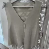 CHALECO DE PUNTO BEIGE CON BRILLO M.CH-BS