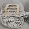 BOLSO CON TRENZADOS BEIGE Y ASAS EN MADERA M.588-B