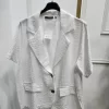 CHAQUETA DE MANGA CORTA EN TONO BLANCO M.CHA/BLA9