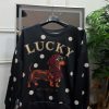 SUDADERA NEGRA LUNARES PERRO M.PELU/NE